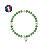 Le "Bracelet Coeur - Perle d'Eau Douce Verte Ronde 5-6 mm" de Perlinea présente une alternance de perles vertes et argentées avec une breloque cœur argentée, sur fond blanc et marquée de fabrication française par un écusson bleu-rouge.