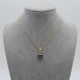 Pendentif en or jaune et perle de culture black Tahiti
