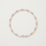 Bracelet en argent 925 orné de perles de culture multicolores roses, blanches et mauves.