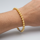 Bracelet Porte Bonheur - Perle d'Eau Douce Dorée