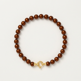 Bracelet perles chocolat nacrées et fermoir anneau en or jaune 9 carats.